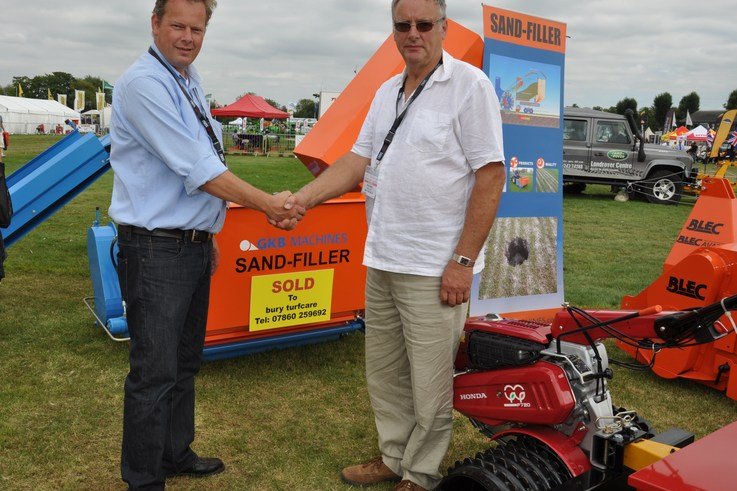 GKB Sandfiller sold at Saltex to Peter Knight, right, of Bury Turfcare, on the BLEC stand with GKB\'s Jan Willem Kraaijeveld DSC 0016