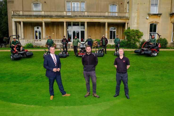 1 - Course manager Karl Williams, centre, with Reesink reps David Timms, left, and Daniel Tomberry, and the club's Toro fleet and greenkeeping team in the background..jpg