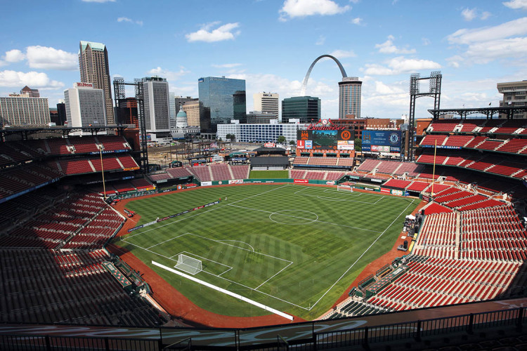 Busch Stadium grounds crew cuts patterns into grass in St. Louis