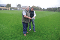 CardinalWiseman Charlie and contractor groundsman Adam Rowlands discuss the maintenance programme, centre pitch