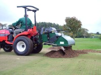 A. 8120 Tractor Aerator and Core Collector tipping.JPG
