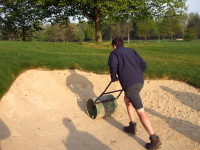 C  Rolling new bunker sand  