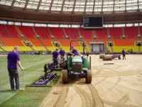 Laying turf in Luzhniki Stadium Moscow with tractor in foreground.jpg
