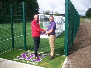 SIS Pitches handing over pitch at St George's Park